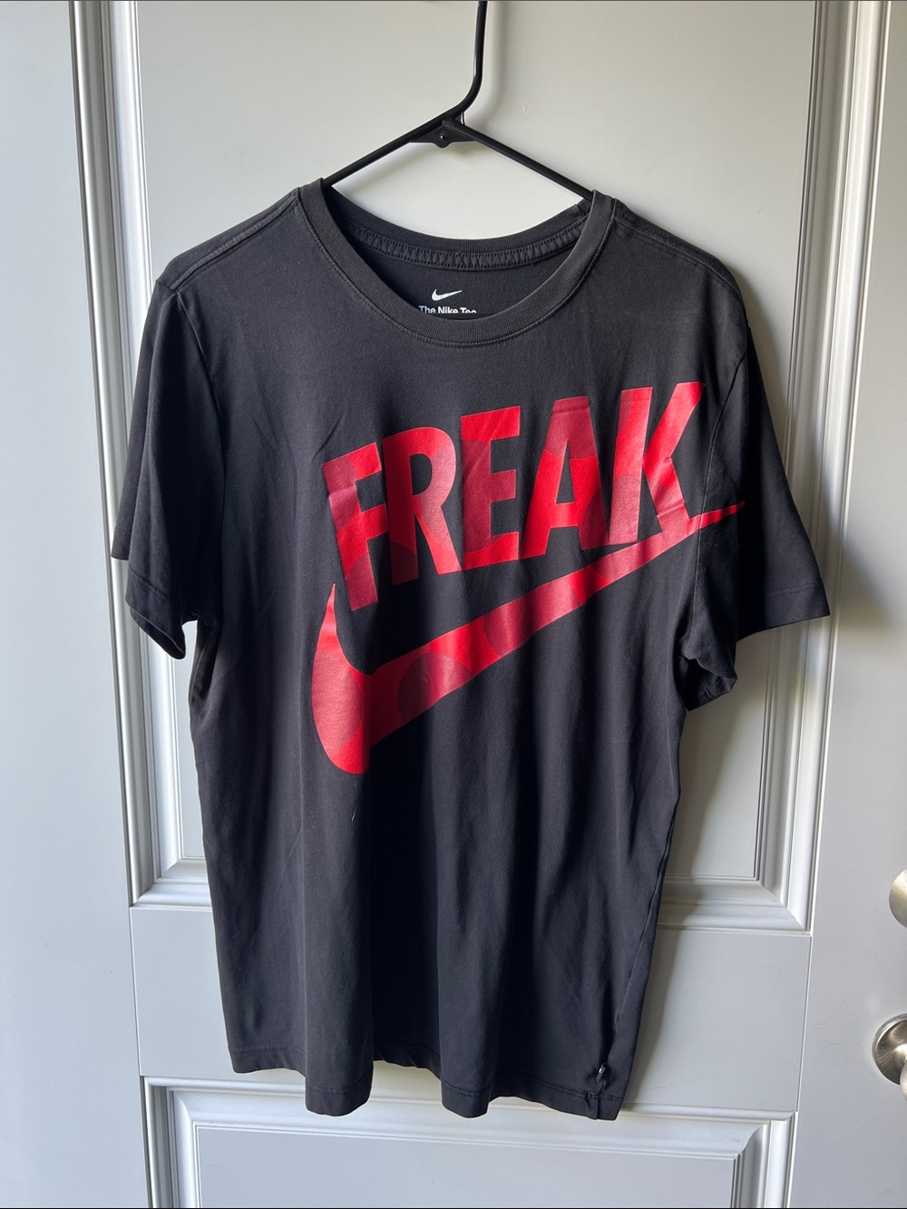 Nike Men’s Black Short-Sleeve Graphic Tee with Red Logo